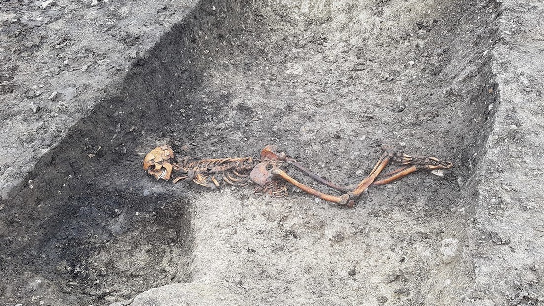 The remains of a man who was killed and buried with his hands bound have been found in the Iron Age in the United Kingdom